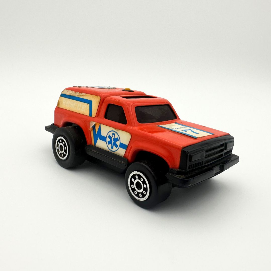 Orange-red die-cast toy car