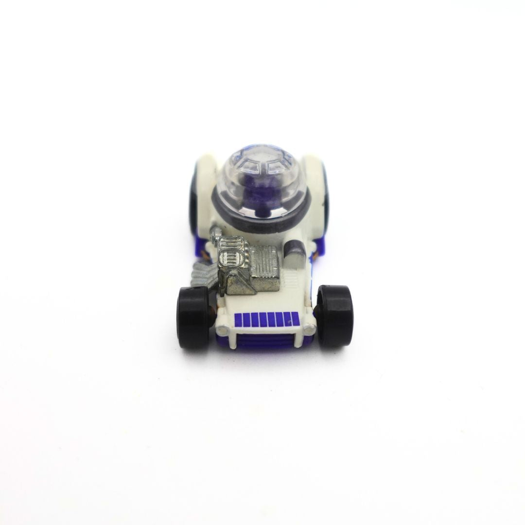 Front of photo of a Star Wars R2D2 matchbox car with blue, white, silver and black colours