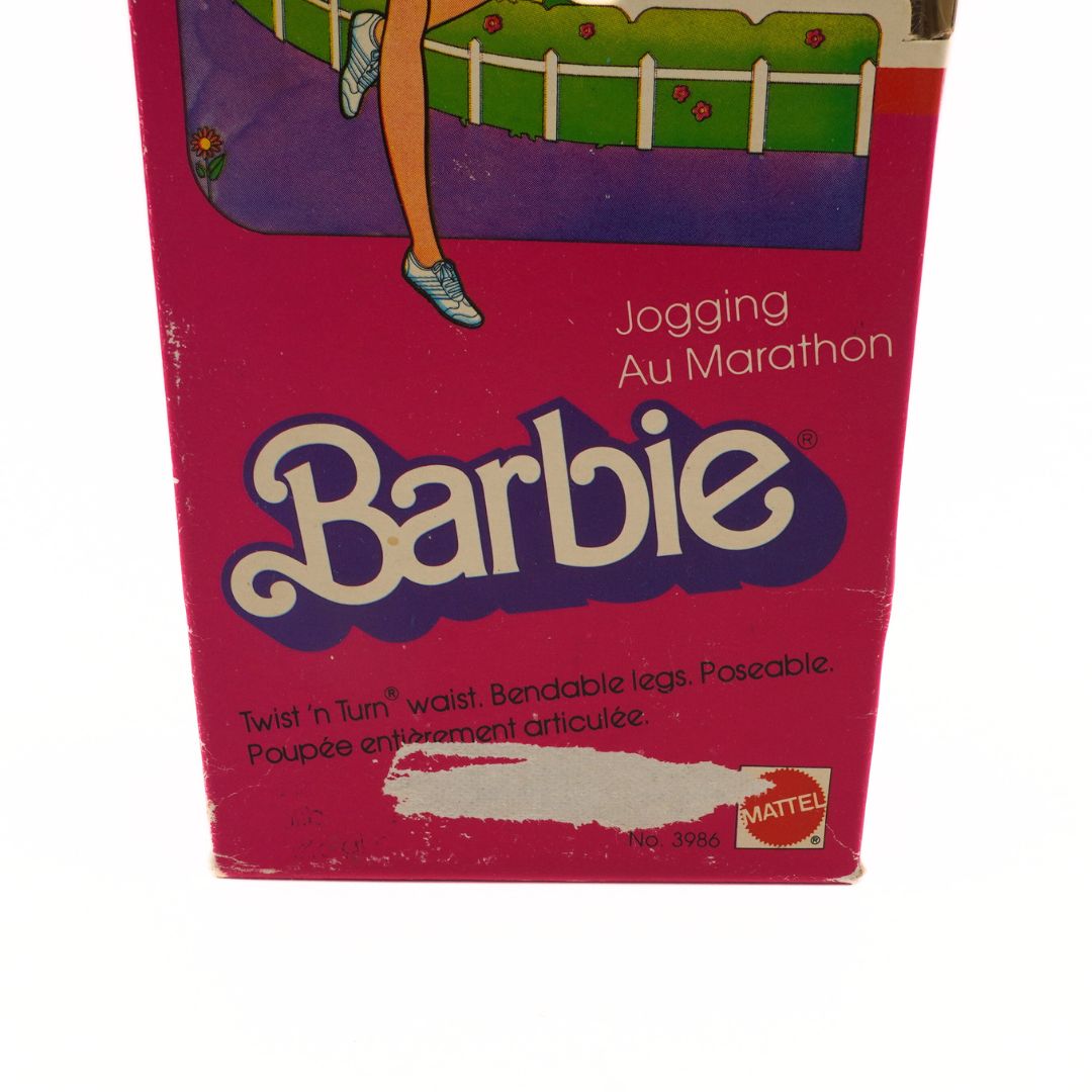 Barbie jogging toy packaging with purple background and Mattel logo.
