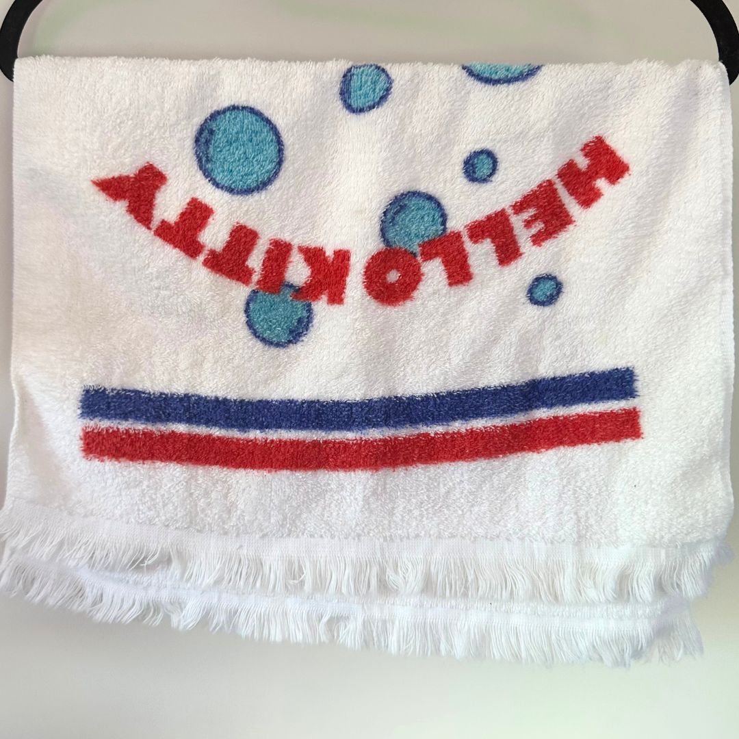 Hello Kitty small vintage towel with a white, blue and red desgin