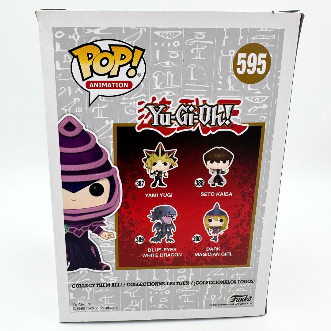 A photo of th eback of the 595 Yu-Gi-Oh Dark Magician Funko Pop featuring illustrations of the other characters in the collection