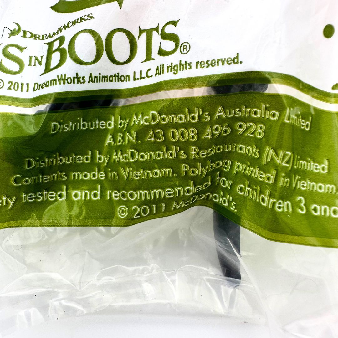 Close up of the packaging of a 2011 McDonalds Happy Meal toy