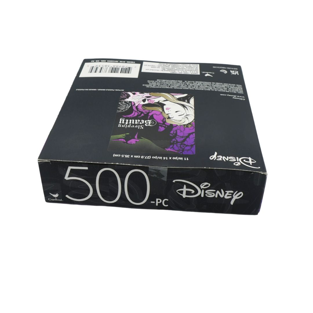A black 500-piece jigsaw puzzle box featuring Disney's 'Sleeping Beauty' artwork on the top and '500 -PC' printed on the side, photographed on a white background.