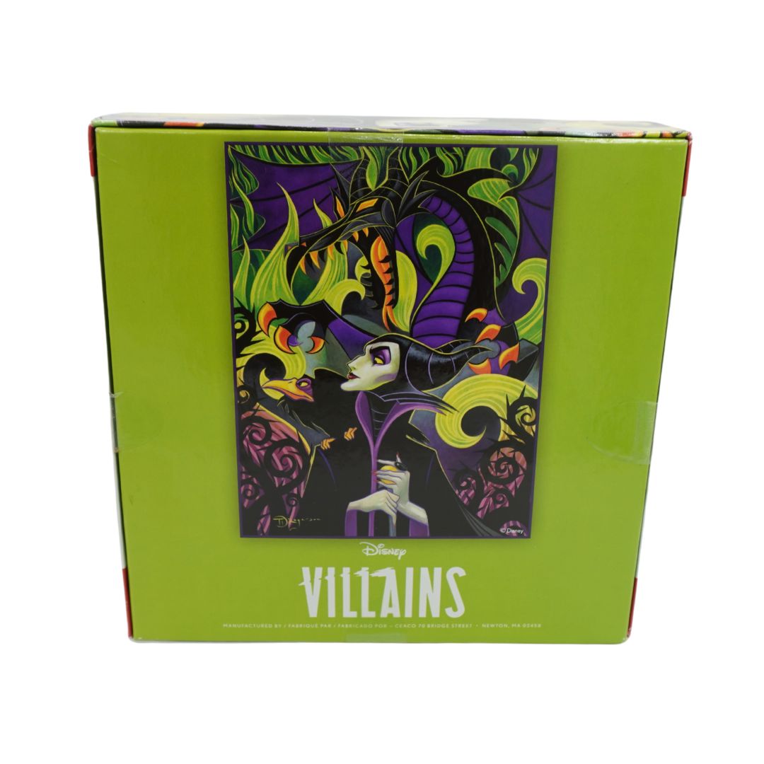 Disney Villains art print in a bright lime green box, featuring Maleficent and a dark dragon on the front cover.
