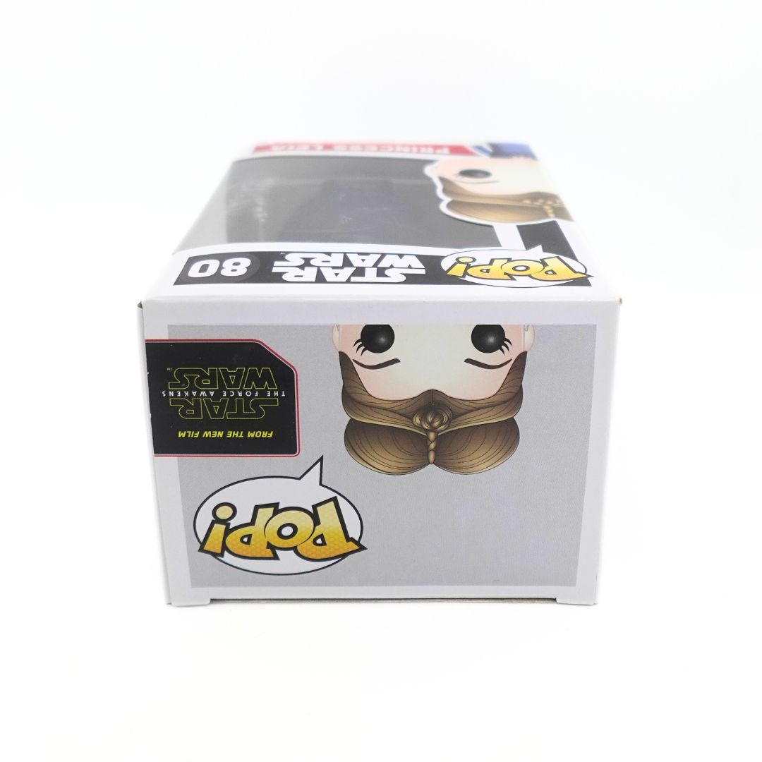 The top side of the box of the number 80 Princess Leia Star Wars Funko Pop, including the branding for the newer Star Wars film called The Force Awakens