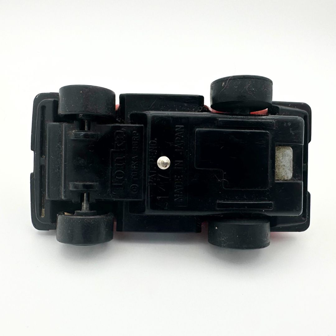 Underside of a vintage toy car