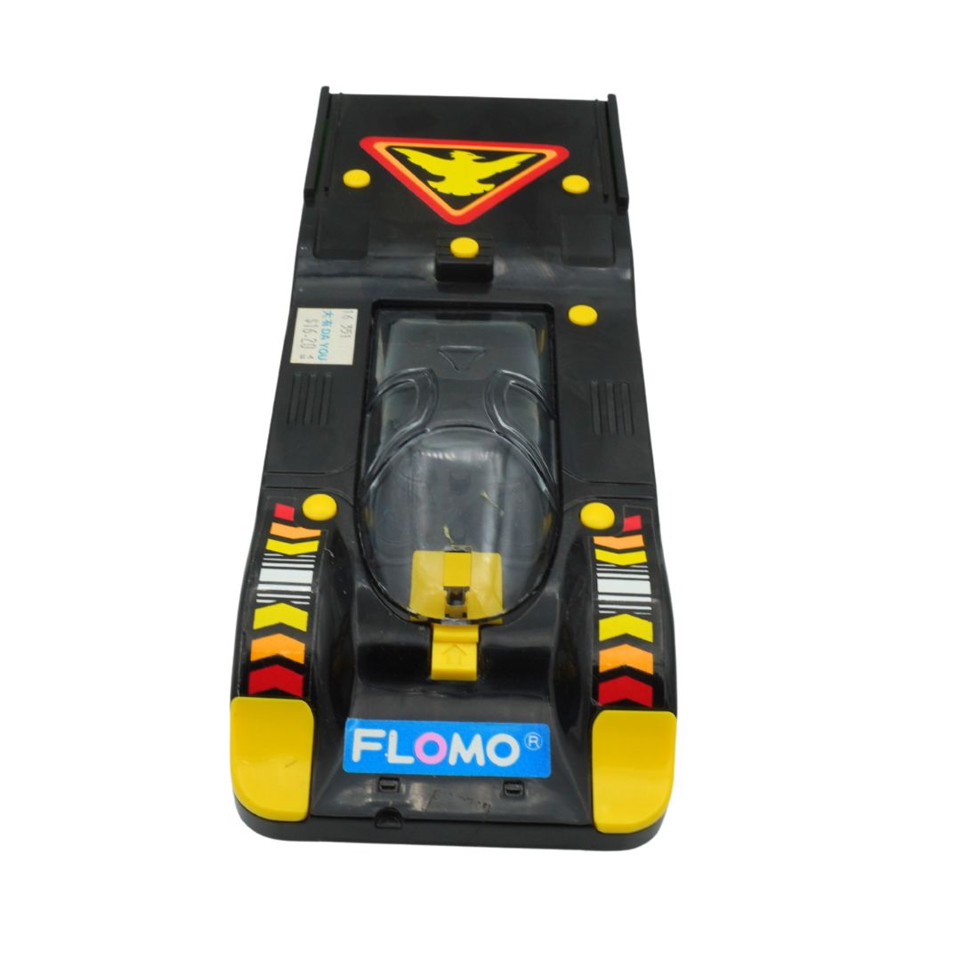 Toy car with black and yellow design on a white background