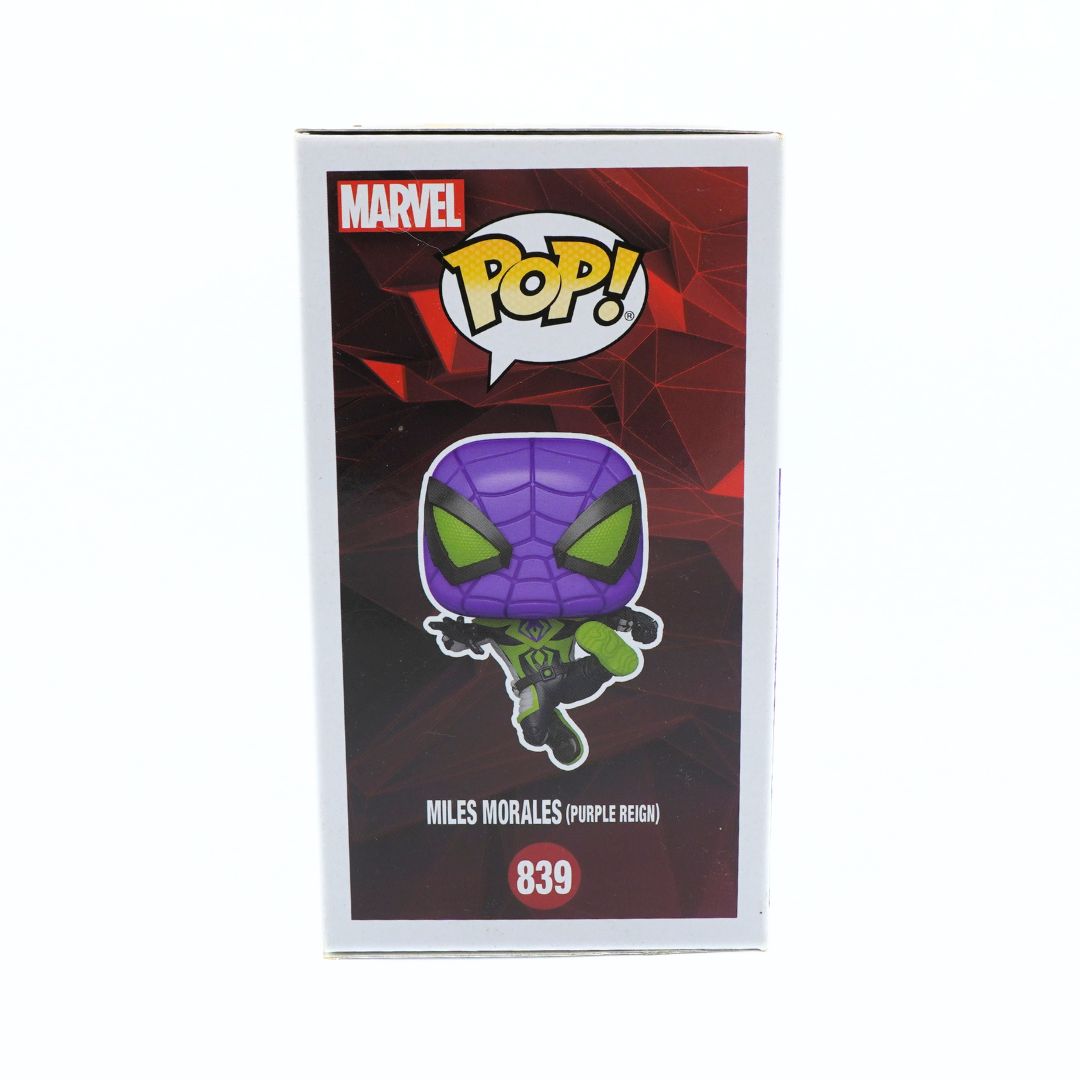 Marvel Pop! vinyl figure of Miles Morales (Purple Reign) in its original retail packaging, featuring a purple and green character on a dark red graphic background.