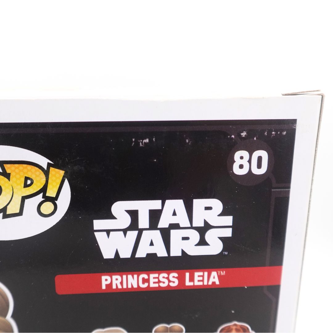 Close up of the number 80 Funko Pop featuring Princess Leia, with some marks to the box