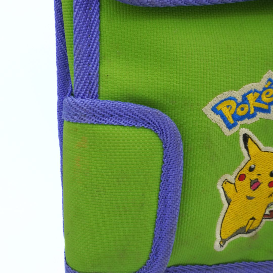 Green bag with blue strap and Pikachu patch featuring the Pokémon logo.