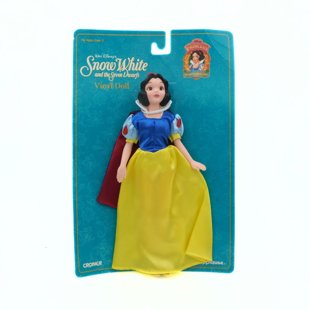 Snow White toy figure in packaging with blue background