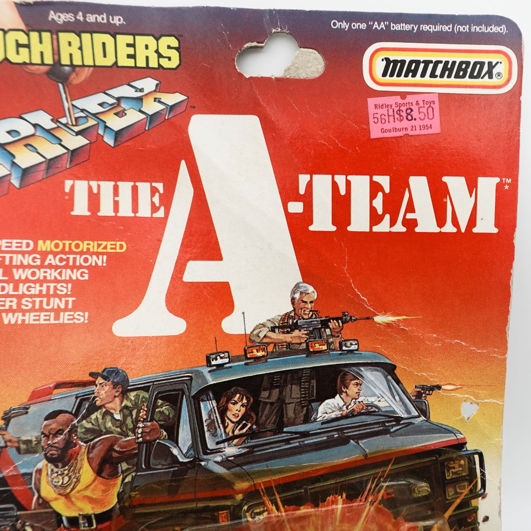 Matchbox A-Team toy cardback showing a small hole to the right and creasing to the red and orange cardback