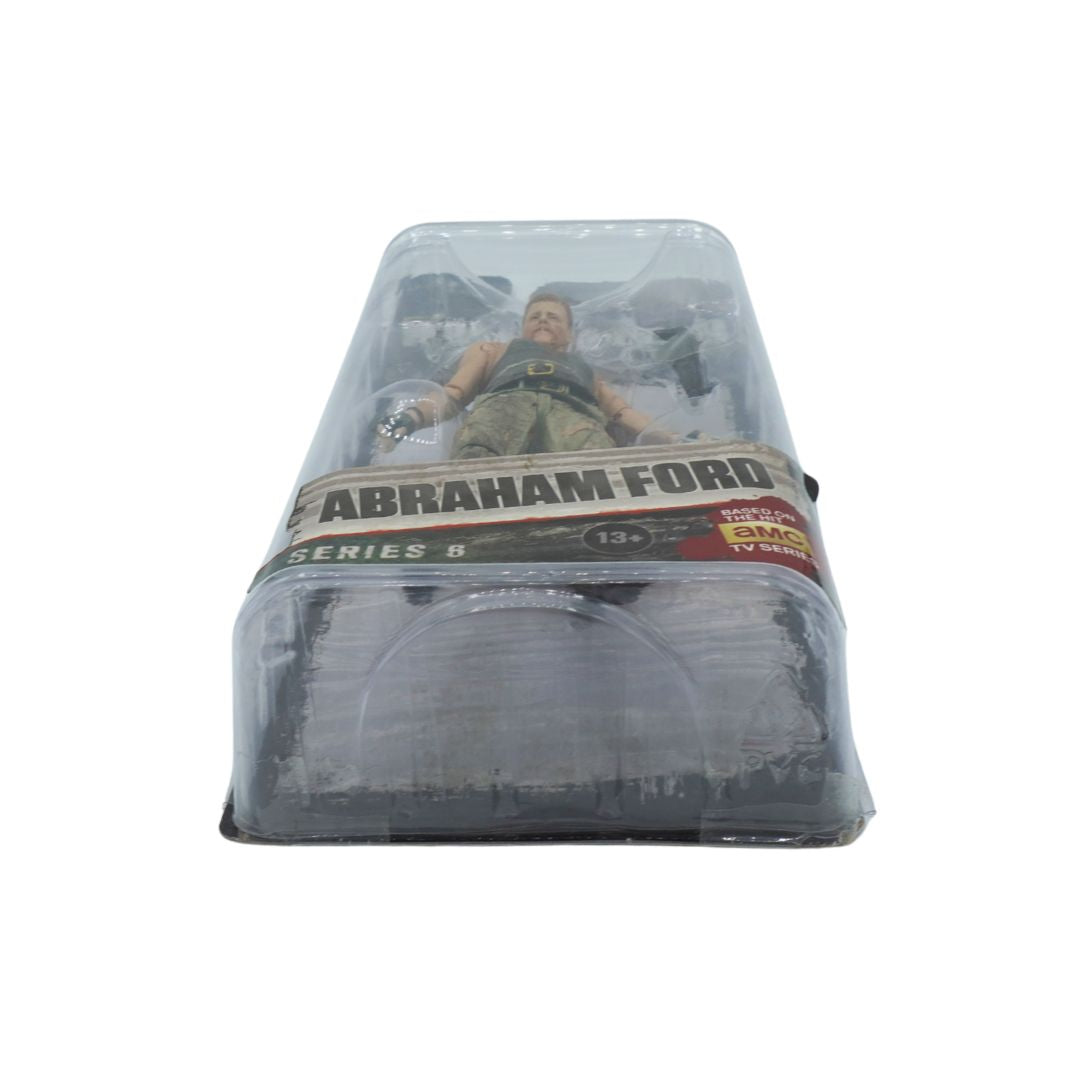 Action figure in packaging with 'Abraham Ford' branding on a white background