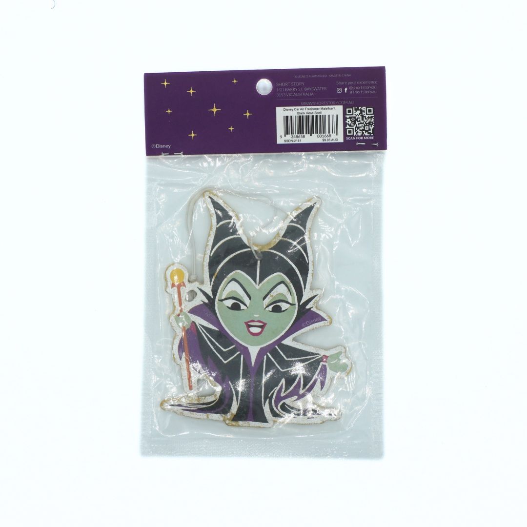A Maleficent air freshener in its original retail packaging, featuring a purple header card with a barcode and a clear plastic bag containing the pin.