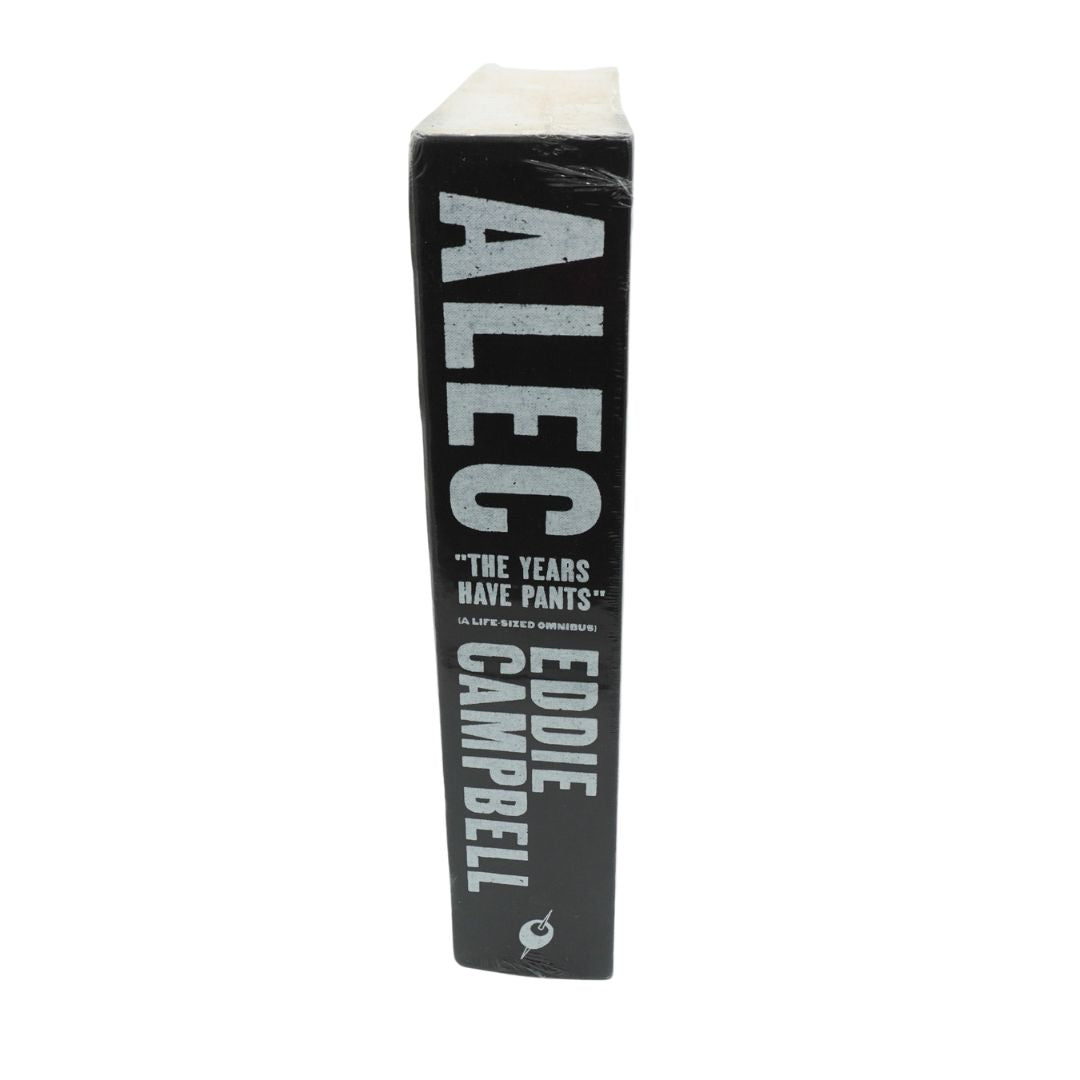 Spine of a black and brown book called Alec The Years Have Pants by Eddie Campbell