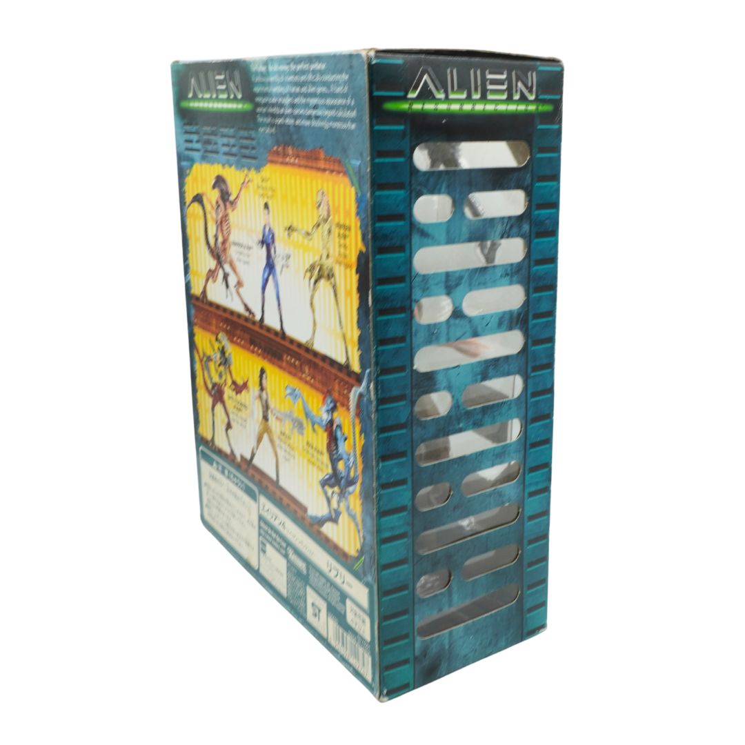 Vintage 'Alien' movie action figure box with character illustrations on a white background