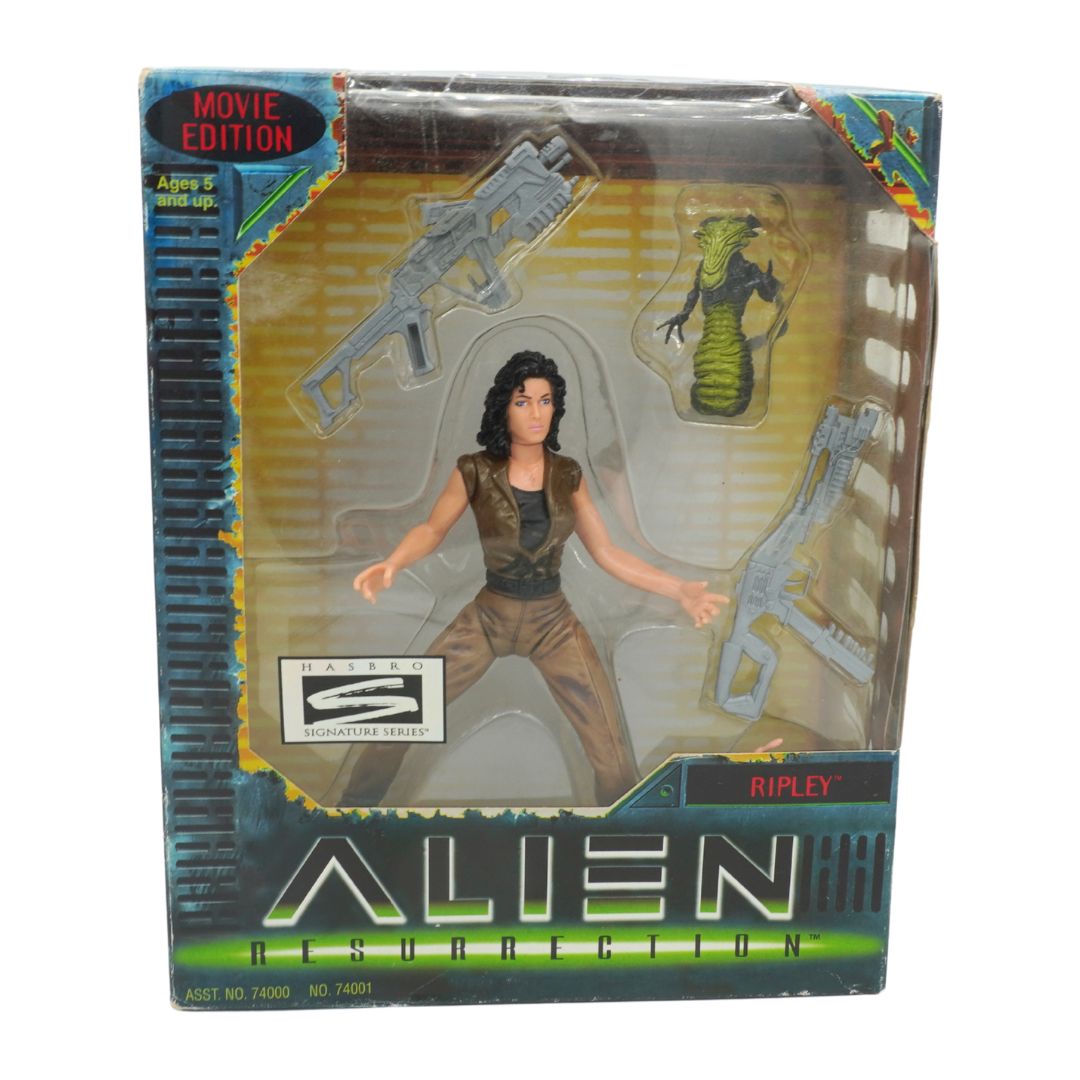 Toy figure packaging featuring a character from 'Alien Resurrection' with weapons and alien figure.