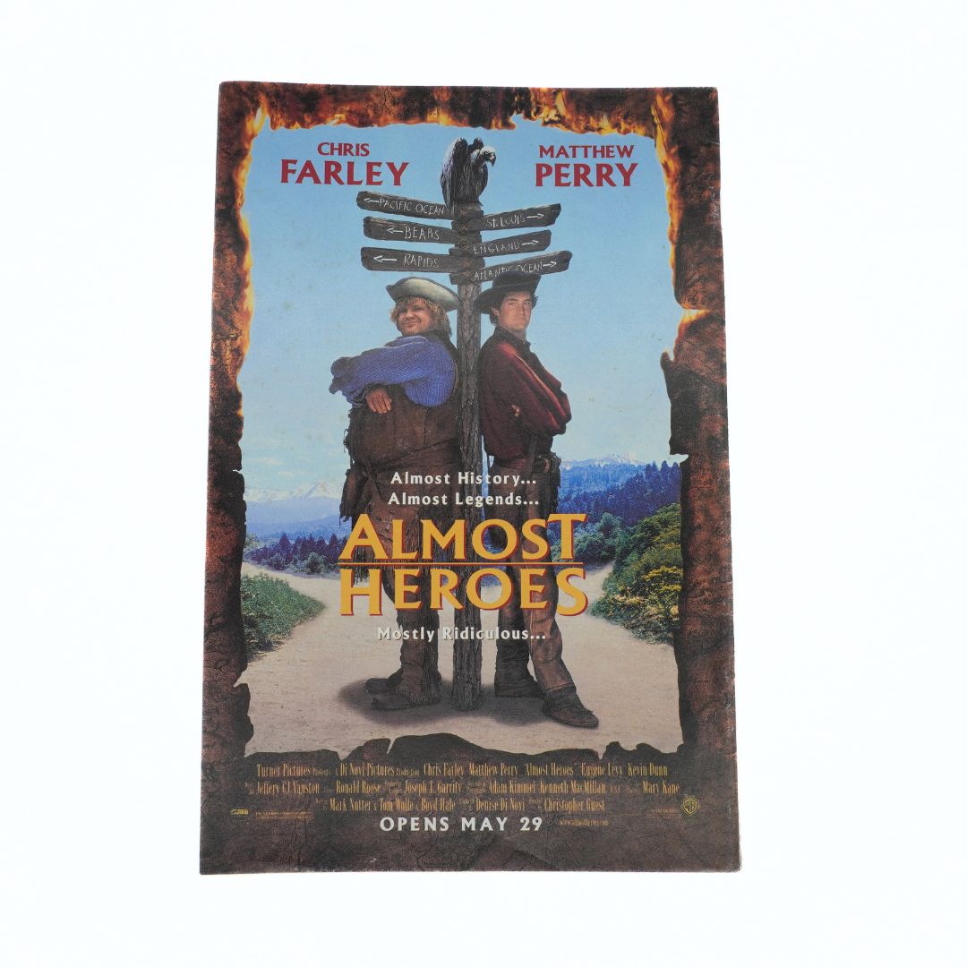 Movie poster for 'Almost Heroes' featuring two characters and a signpost.