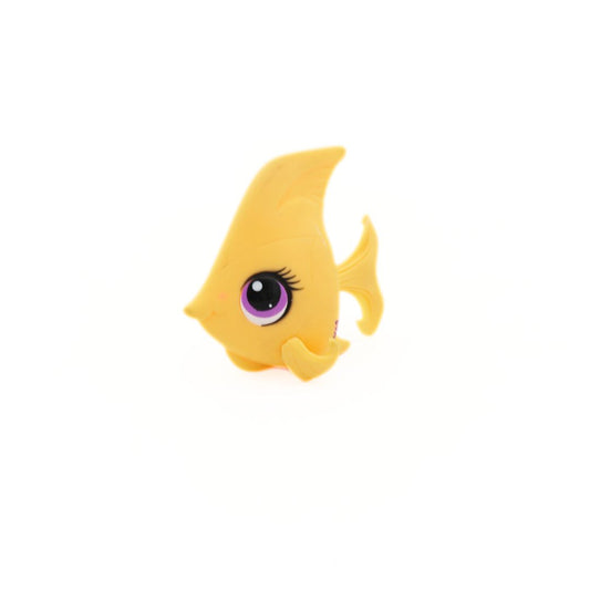 Yellow fish-shaped object with a purple eye on a white background