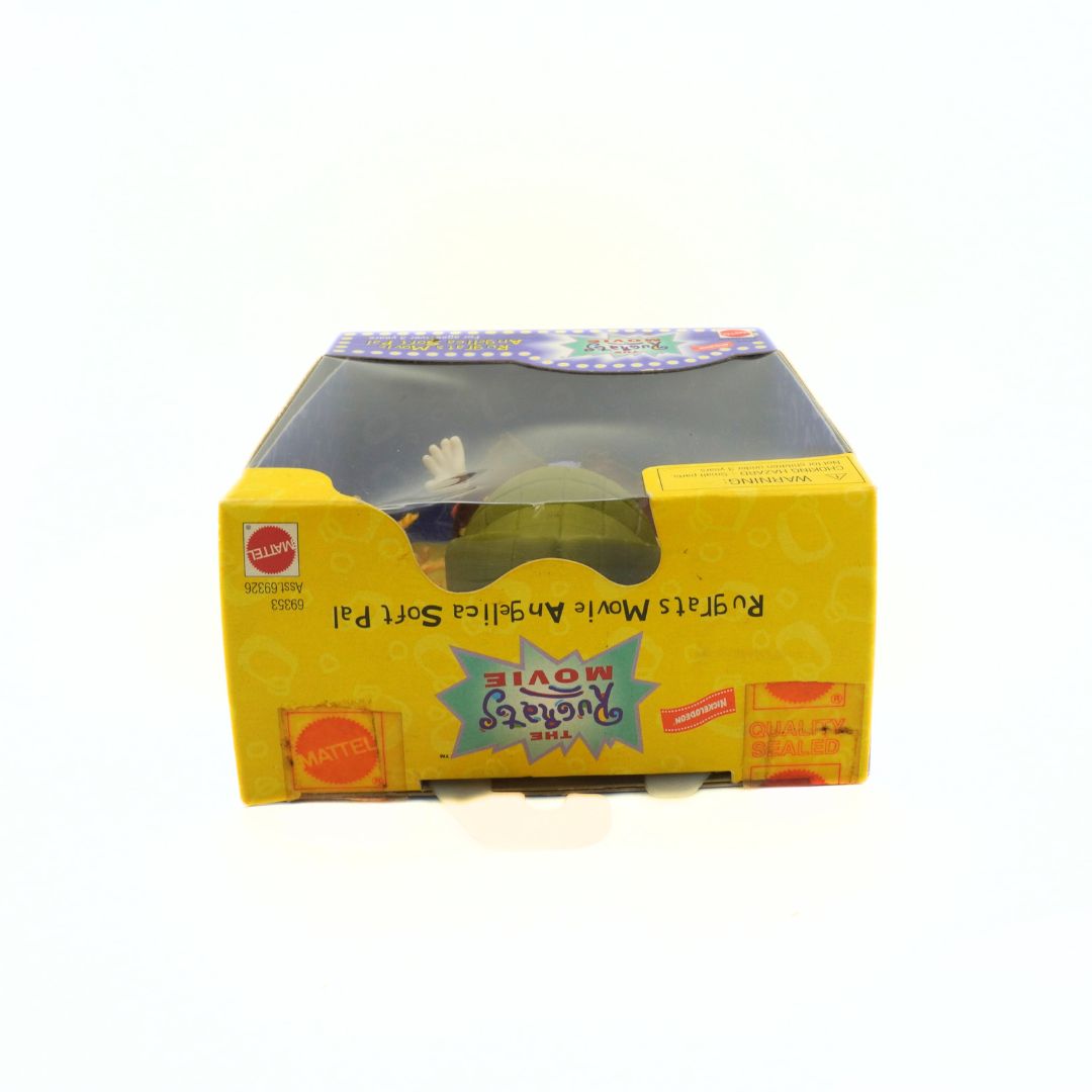 Top down photo of a Rugrats Movie Angelica doll in its original packaging