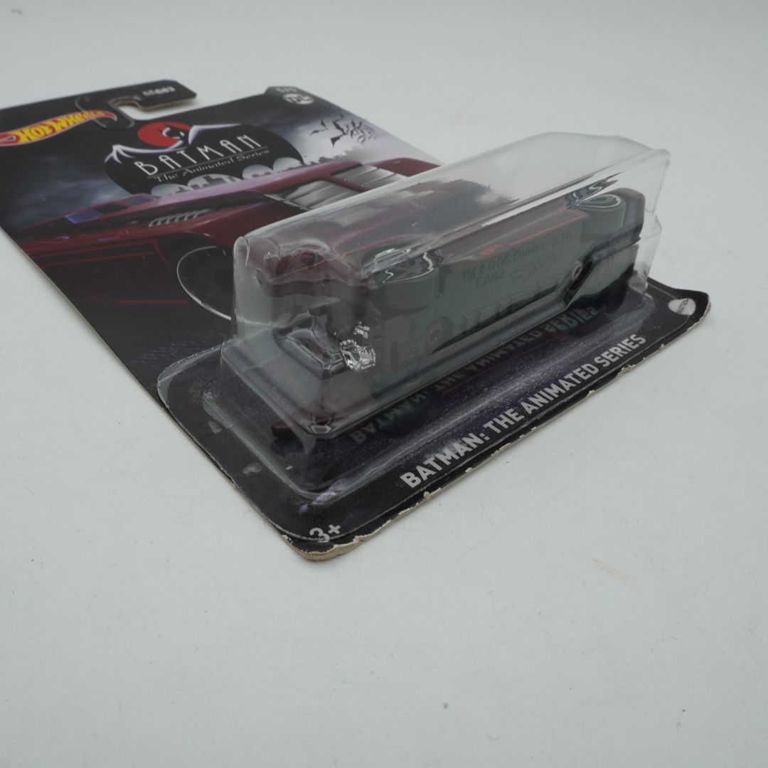 Model car in clear packaging with 'Batman: The Animated Series' branding on a white background