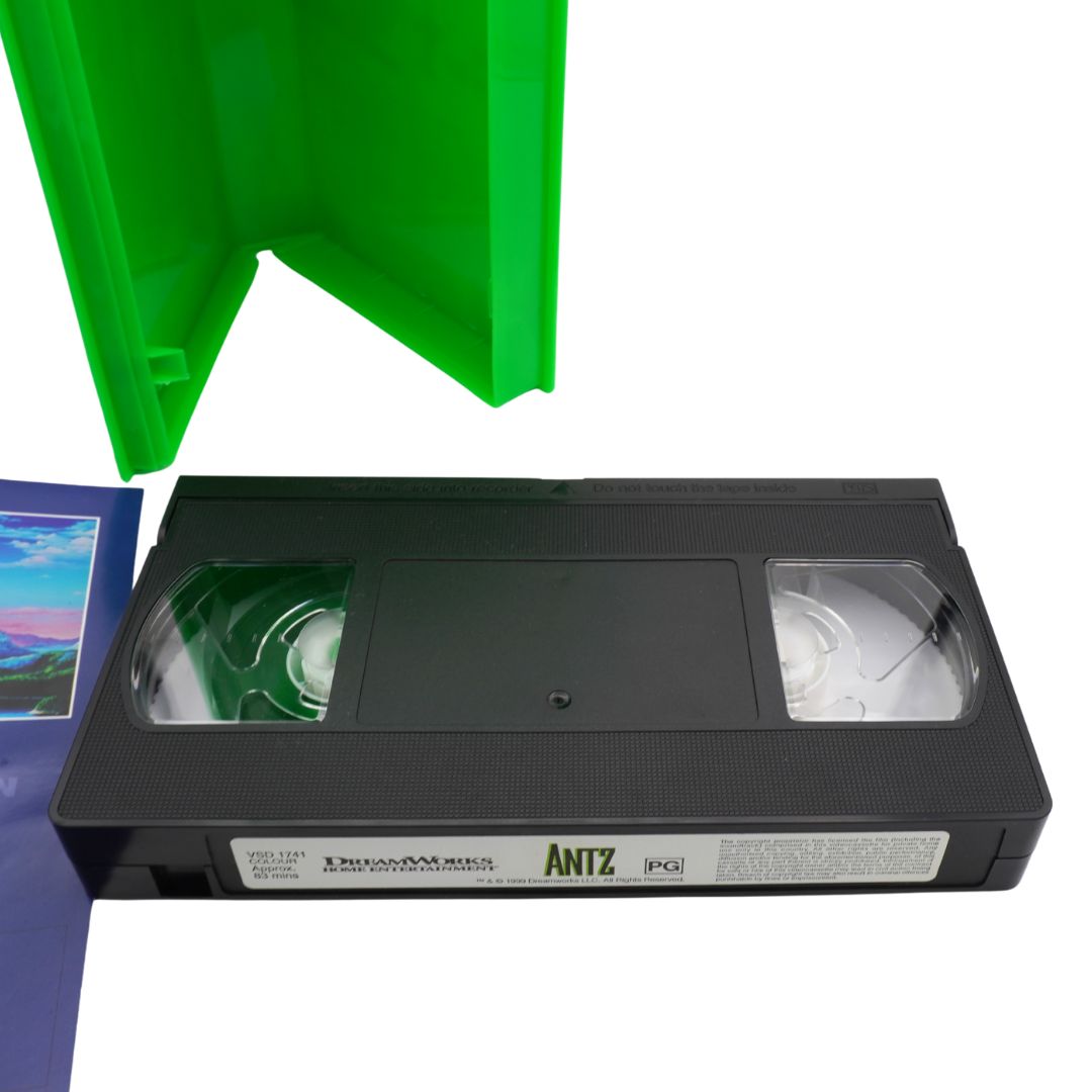 VHS tape with green cover and visible 'Antz' branding on a white background