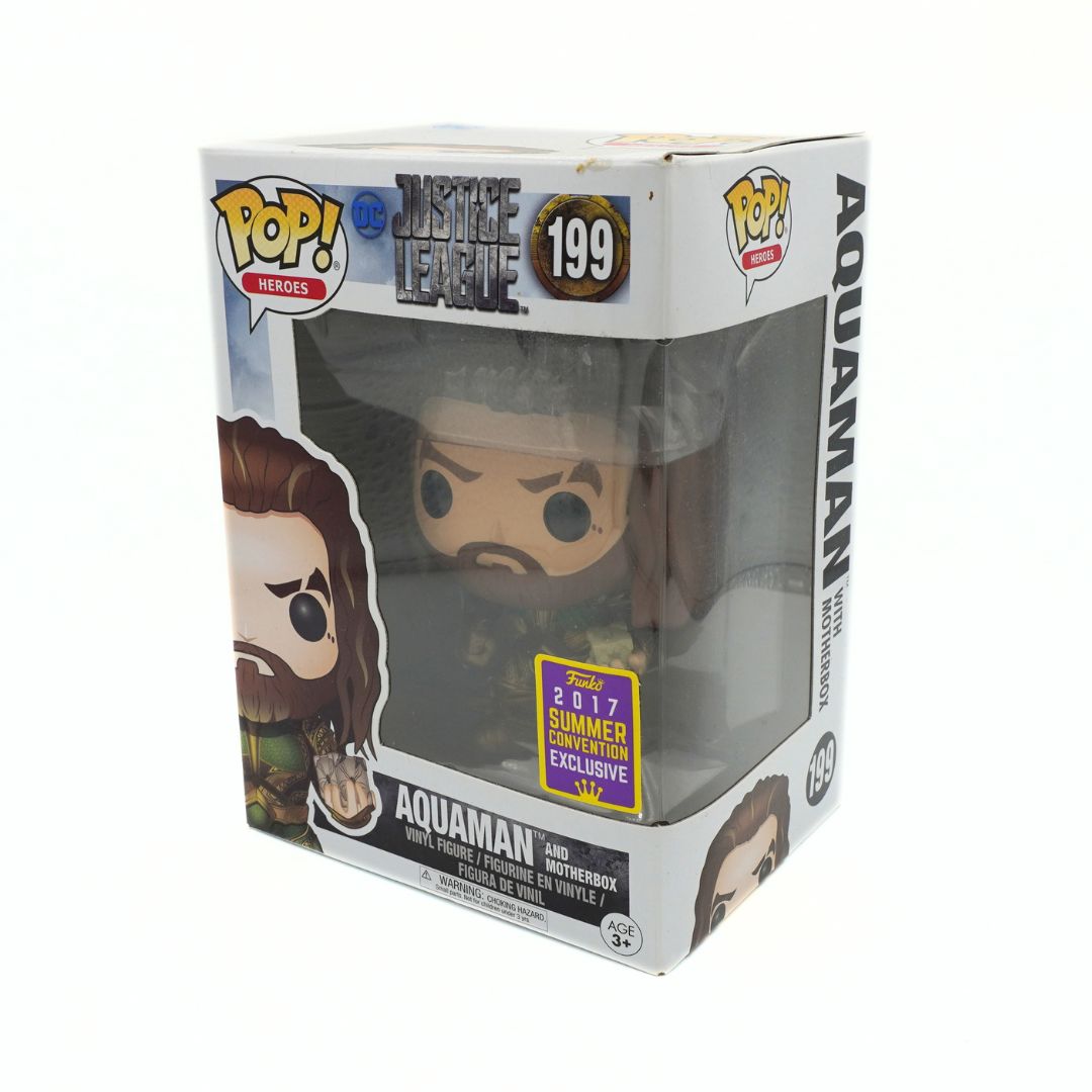 Funko Pop! Movies Justice League Aquaman vinyl figure in its original window box packaging, featuring a 2017 Summer Exhibition Exclusive sticker.