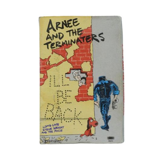 A vintage comic book titled 'Arnee and the Terminators' featuring a cracked yellow brick wall, a blue-suited figure, and a red dog on the cover, photographed against a plain white background.