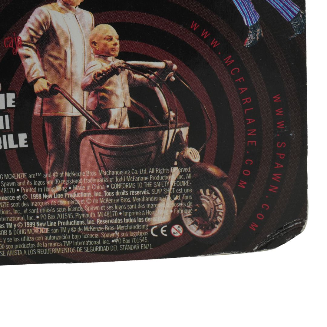 Back of a toy packaging with characters and branding details.