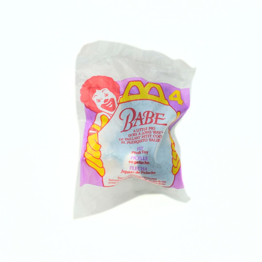 Back of an unopened 1995 Happy Meal Babe toy of the Border Collie Fly