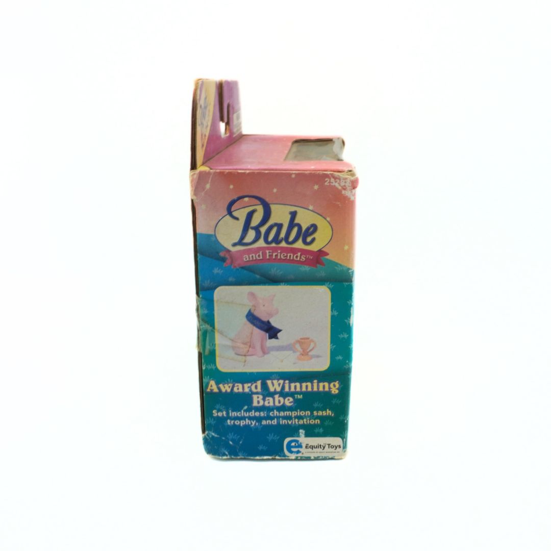 Vintage packaging of Babe and Friends toy set on a white background