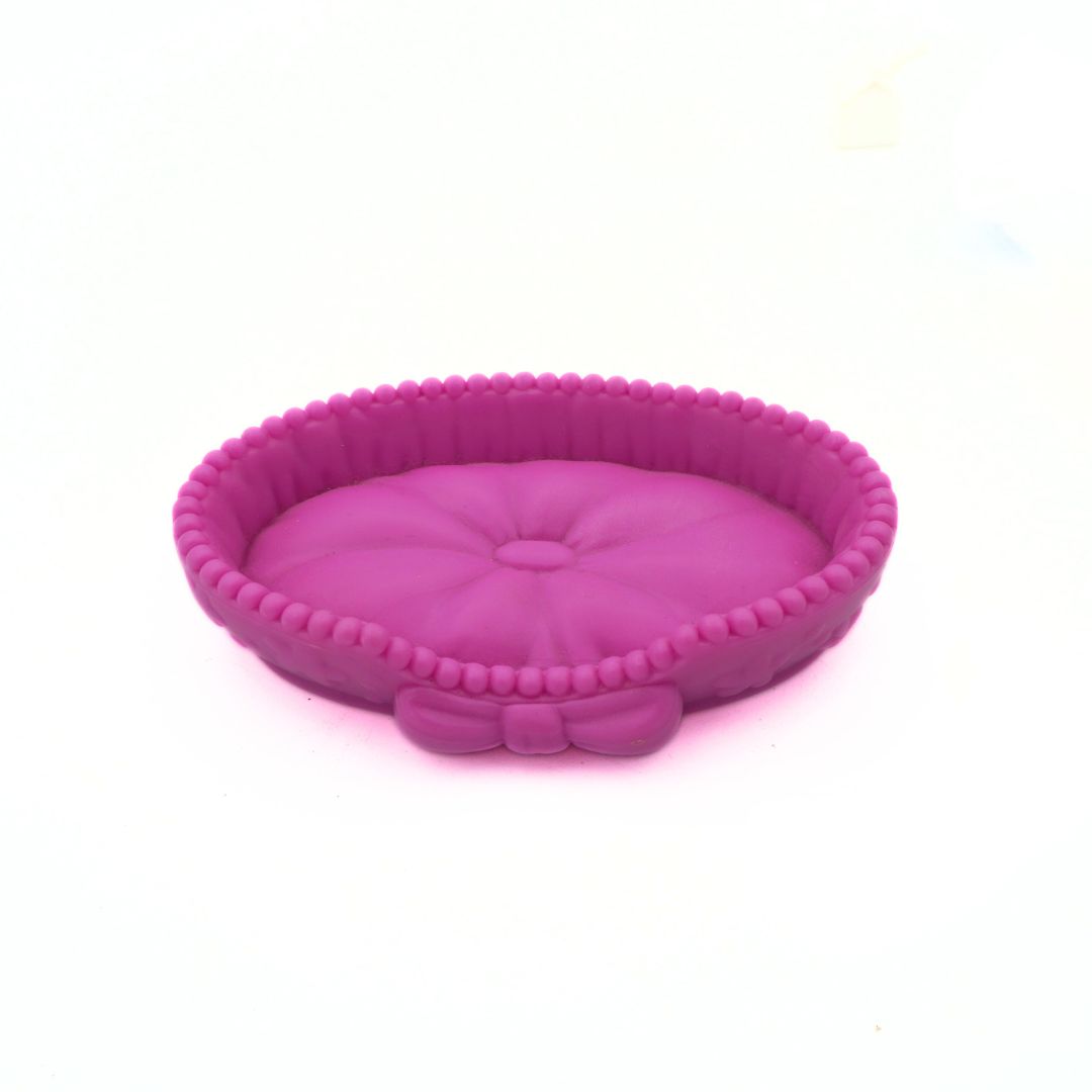 Pink cat bed from a Littlest Pet Shop playset