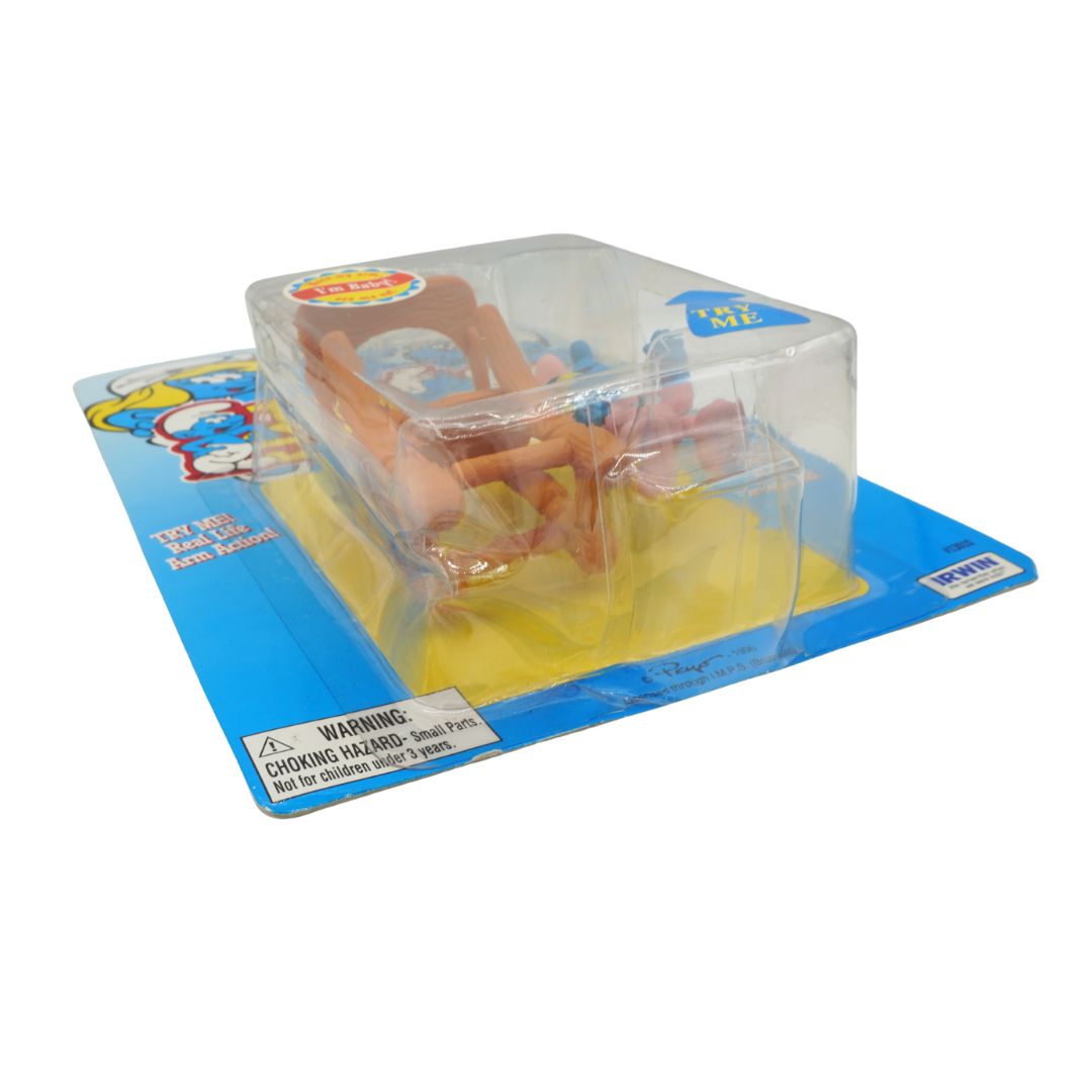 Toy set in clear plastic packaging on a blue and yellow card with a warning label.