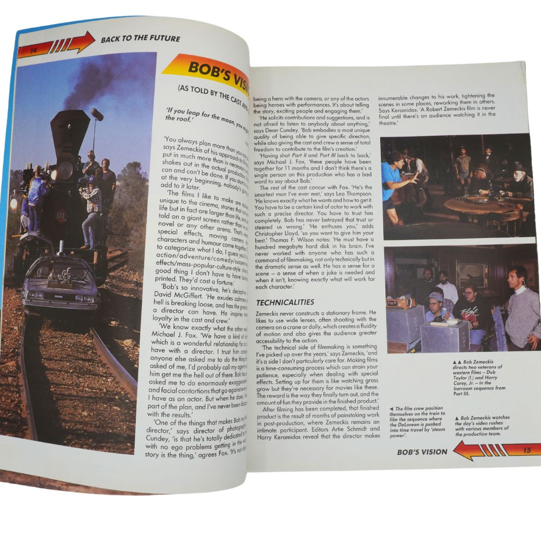 Open book with text and images related to 'Back to the Future' movie, featuring a DeLorean and people around it.