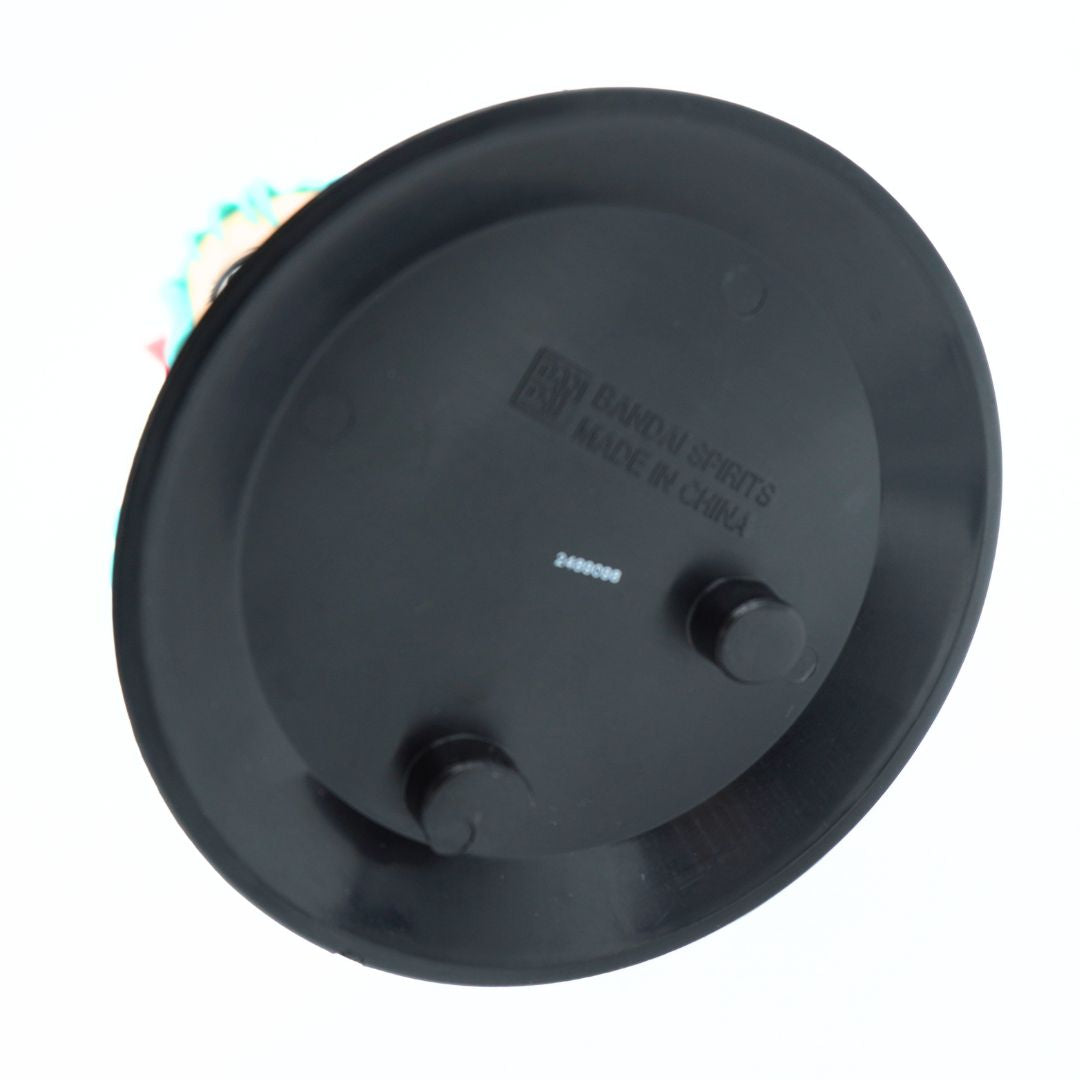 A black circular plastic component with two small protruding tabs and embossed text reading 'BANDAI SPIRITS MADE IN CHINA' on a white background.