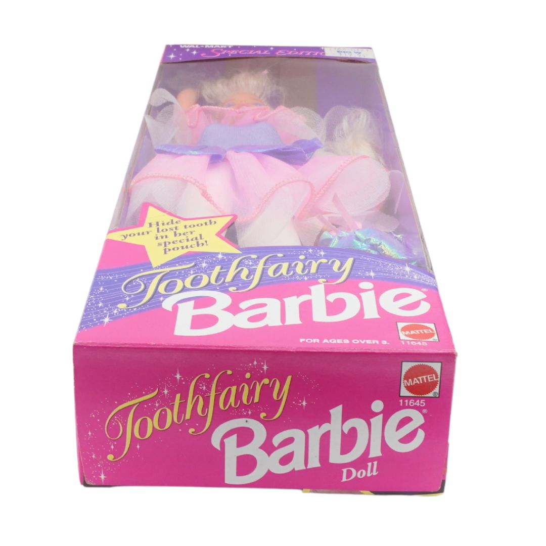 Tooth Fairy Barbie doll packaging with pink and purple design