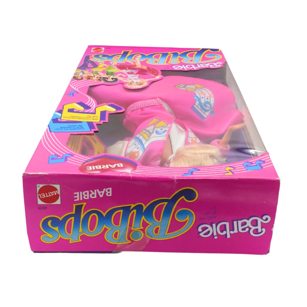 Barbie BiBops toy in pink packaging with Mattel logo