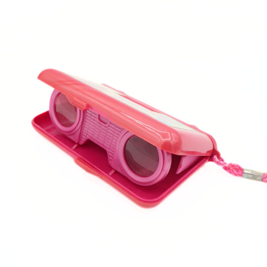 Pink toy binoculars with a matching pink protective cover and strap, shown on a plain white background.