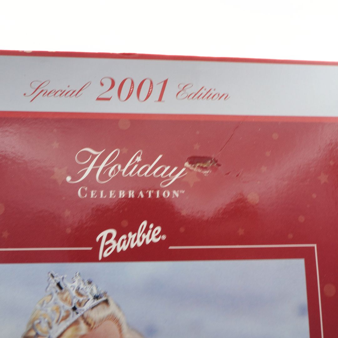 Barbie Holiday Celebration 2001 edition packaging with red and white design.