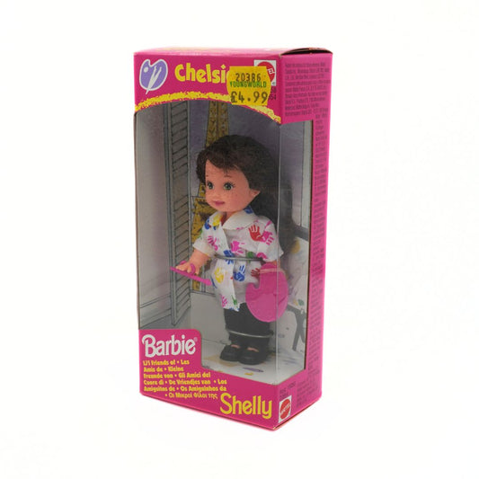 Barbie Chelsea doll packaging with pink and purple box on a white background