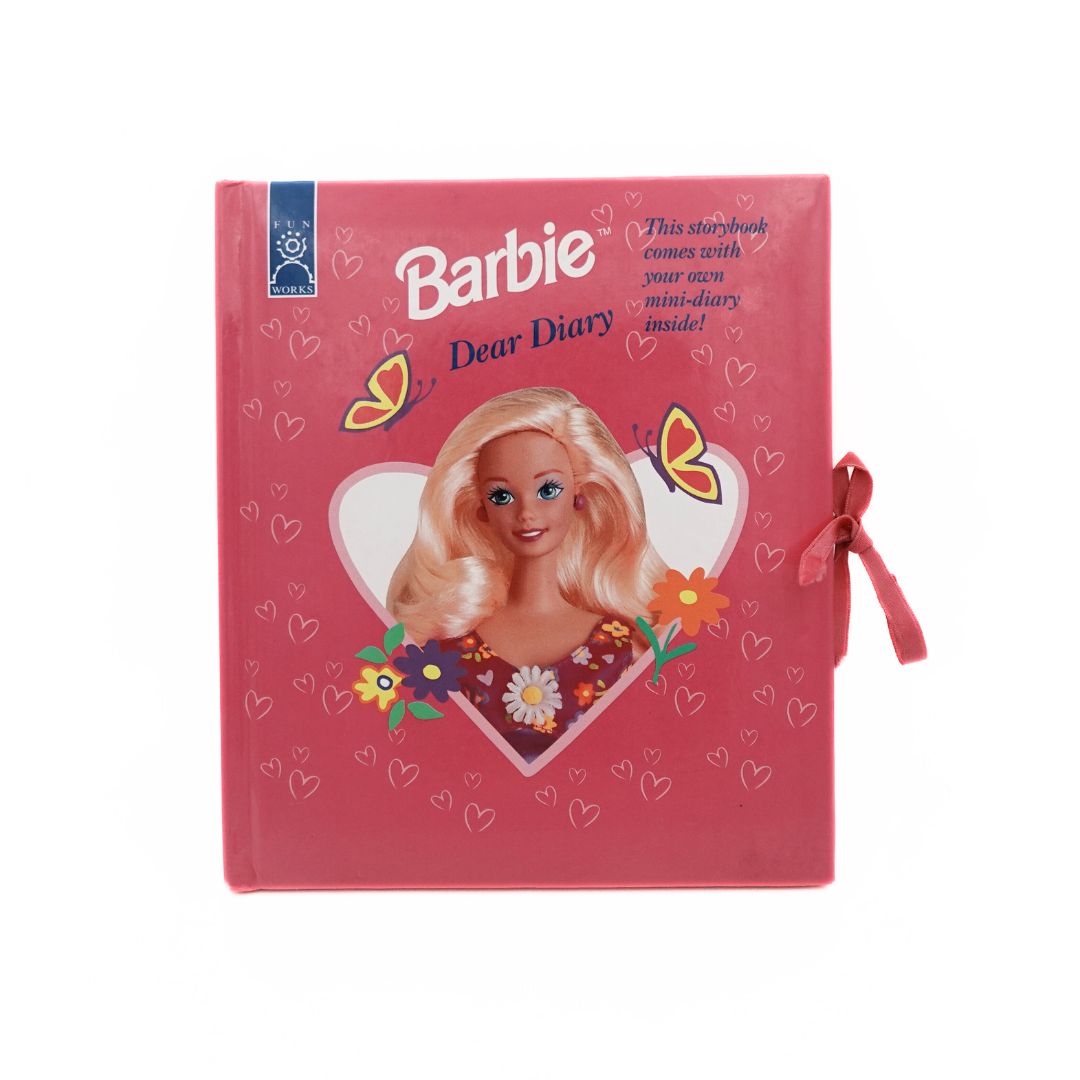 Front cover of the pink 1996 Barbie Dear Diary book, with a pink tie ribbon