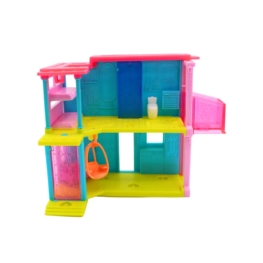 A colorful plastic toy house dollhouse with multiple levels, featuring pink, blue, yellow, and green translucent plastic panels, a small orange swing, and a tiny white vase.