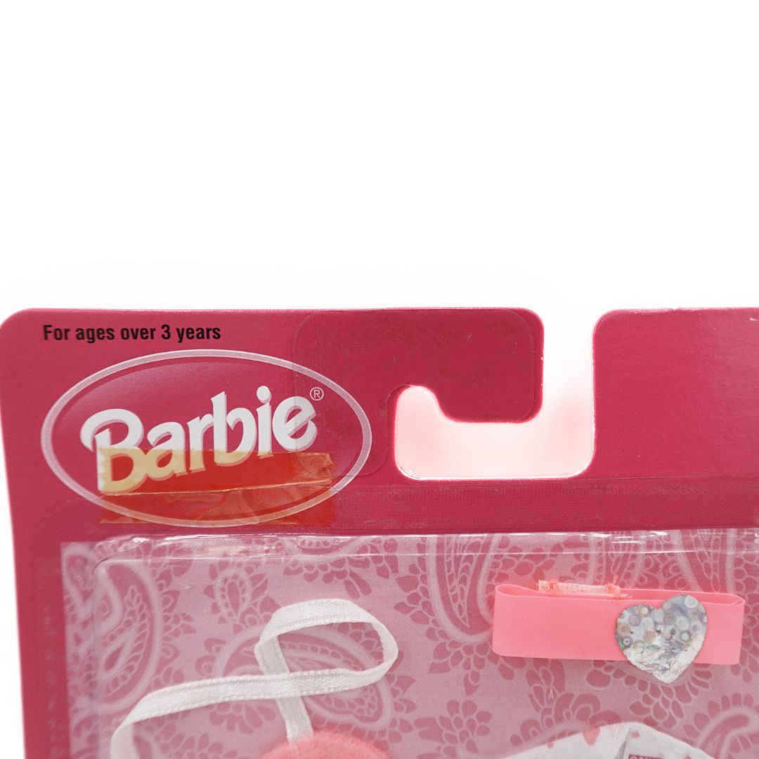 Swing tag at the top of a 90's Barbie Fashion Touches heart accessory set