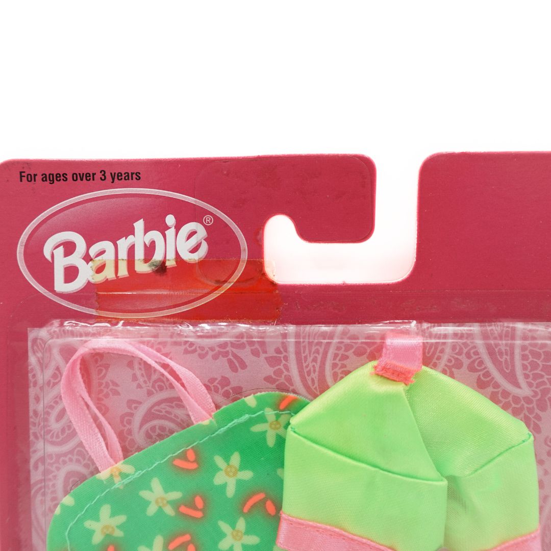 Photo showing discolouration on tape on the 1998 Barbie Fashion Touches Green Accessory set