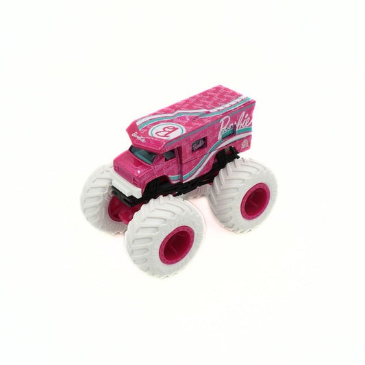 A pink Barbie monster truck toy with oversized white tires and pink rims, shown on a plain white background.