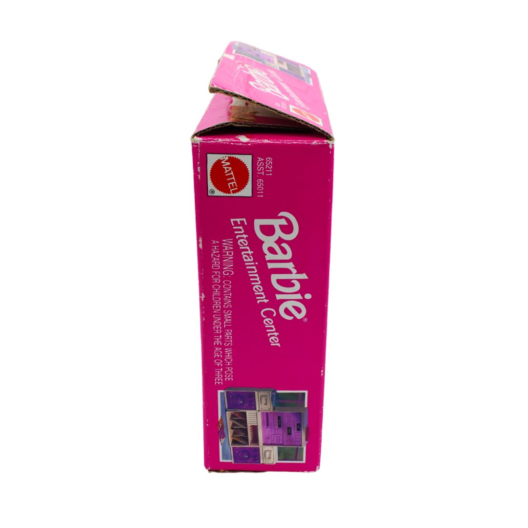 A pink Mattel Barbie Entertainment Center toy box shown upright against a plain white background.