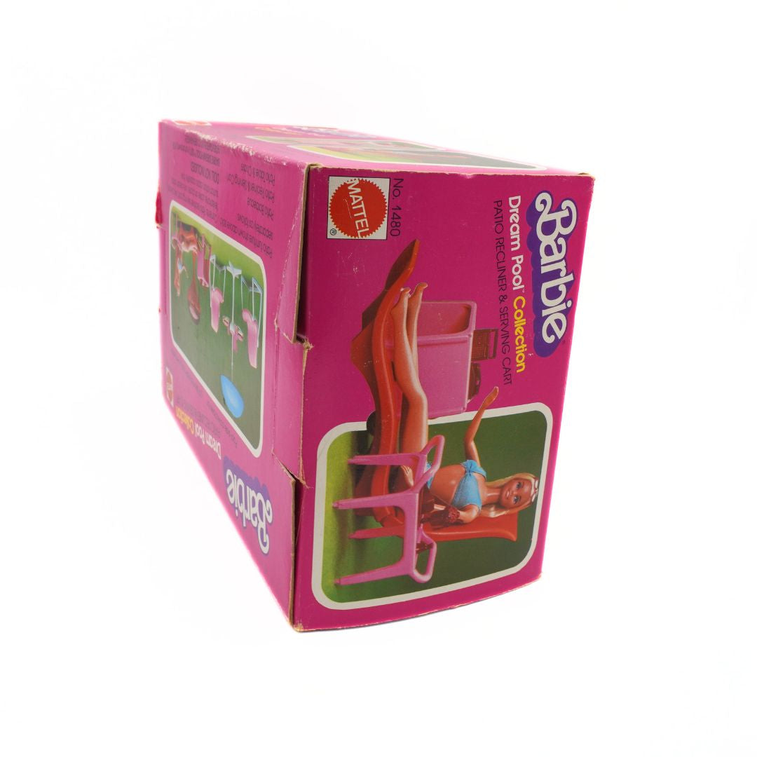 Barbie Dream Pool Collection packaging with lounge chair and pool toy on a white background