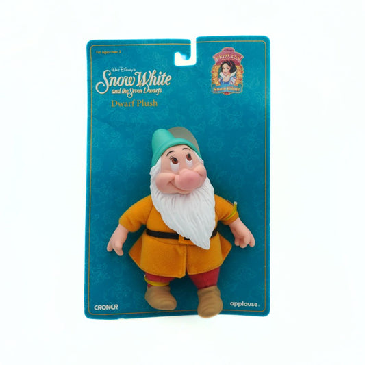 Plush toy of a dwarf from 'Snow White' in packaging on a white background
