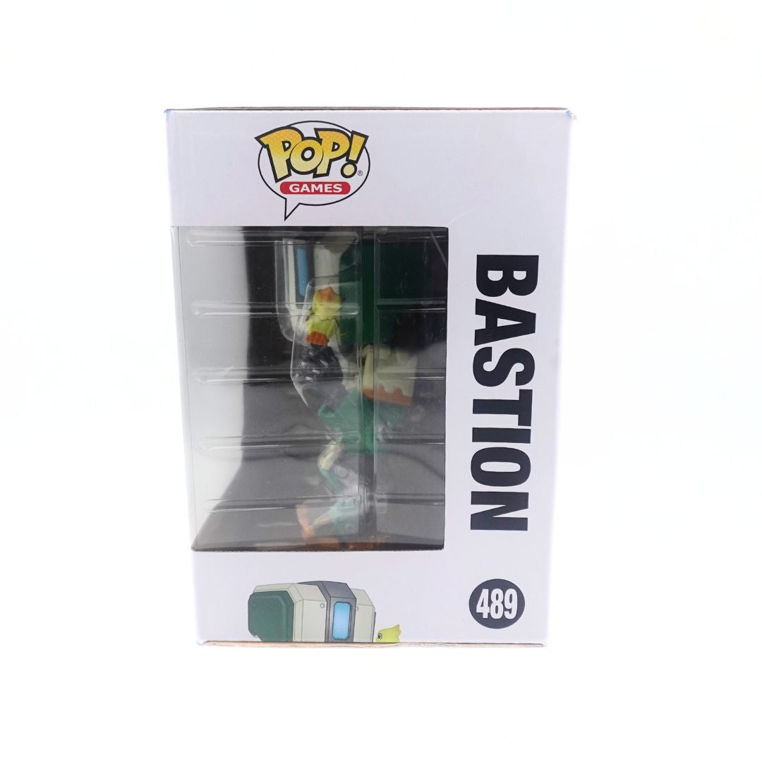 Side on photo of the Bastion large Pop Vinyl Funko Pop seen through the plastic membrane of the packaging