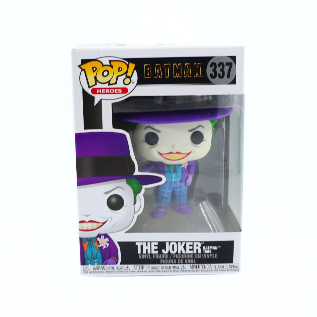 Funko Pop! Heroes vinyl figure of The Joker from Batman, number 337, in its original window box packaging.